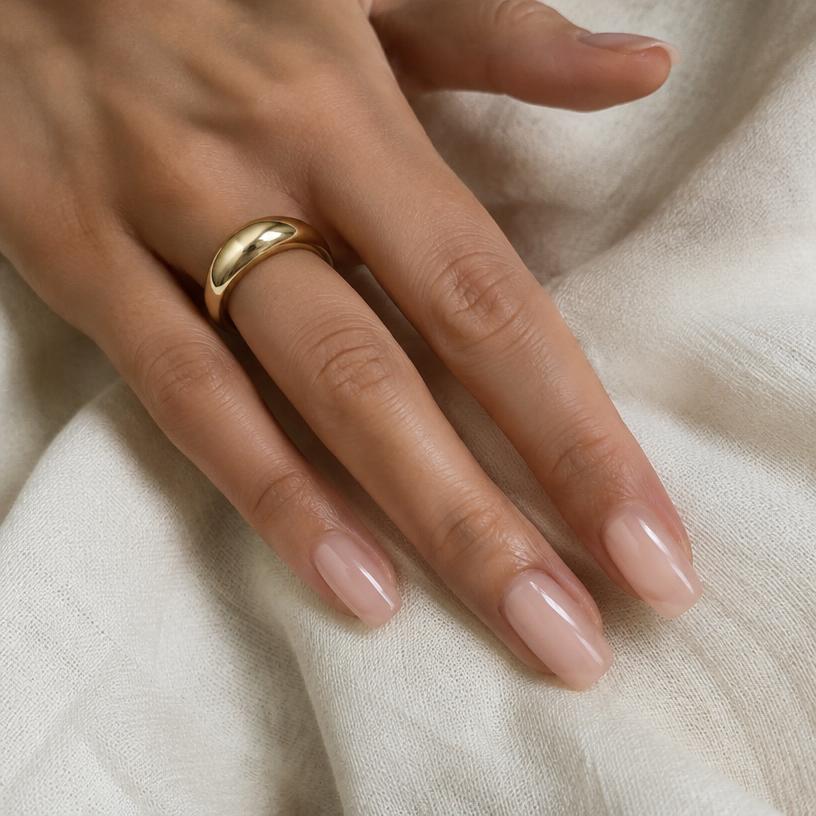 Nude gel manicure with gold ring